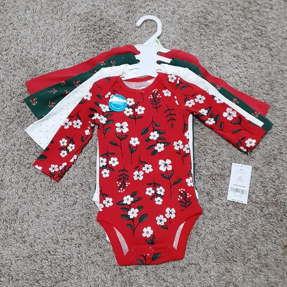 Infants long sleeve onsies set of 4 size 3 months. Retail $28.00 NWT.